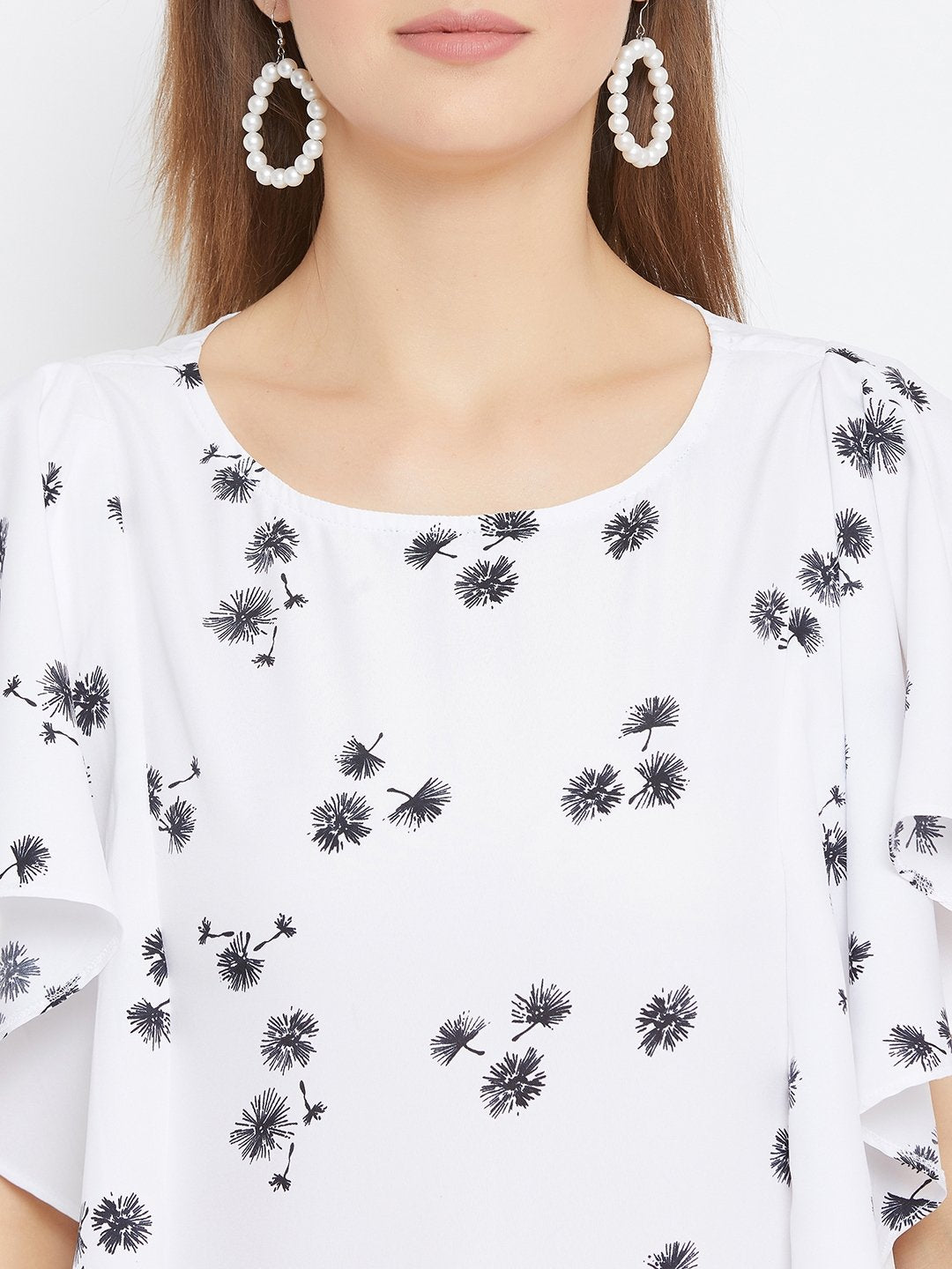 White And Black Printed Ruffle Top.